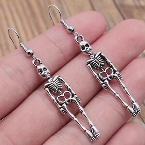 Bundle sale - Pair Of Skull Earrings & a leather cord necklace #1